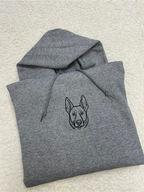 Milo Line personalized pet portrait hoodie with minimal line art embroidery, clean modern design on a pullover hoodie