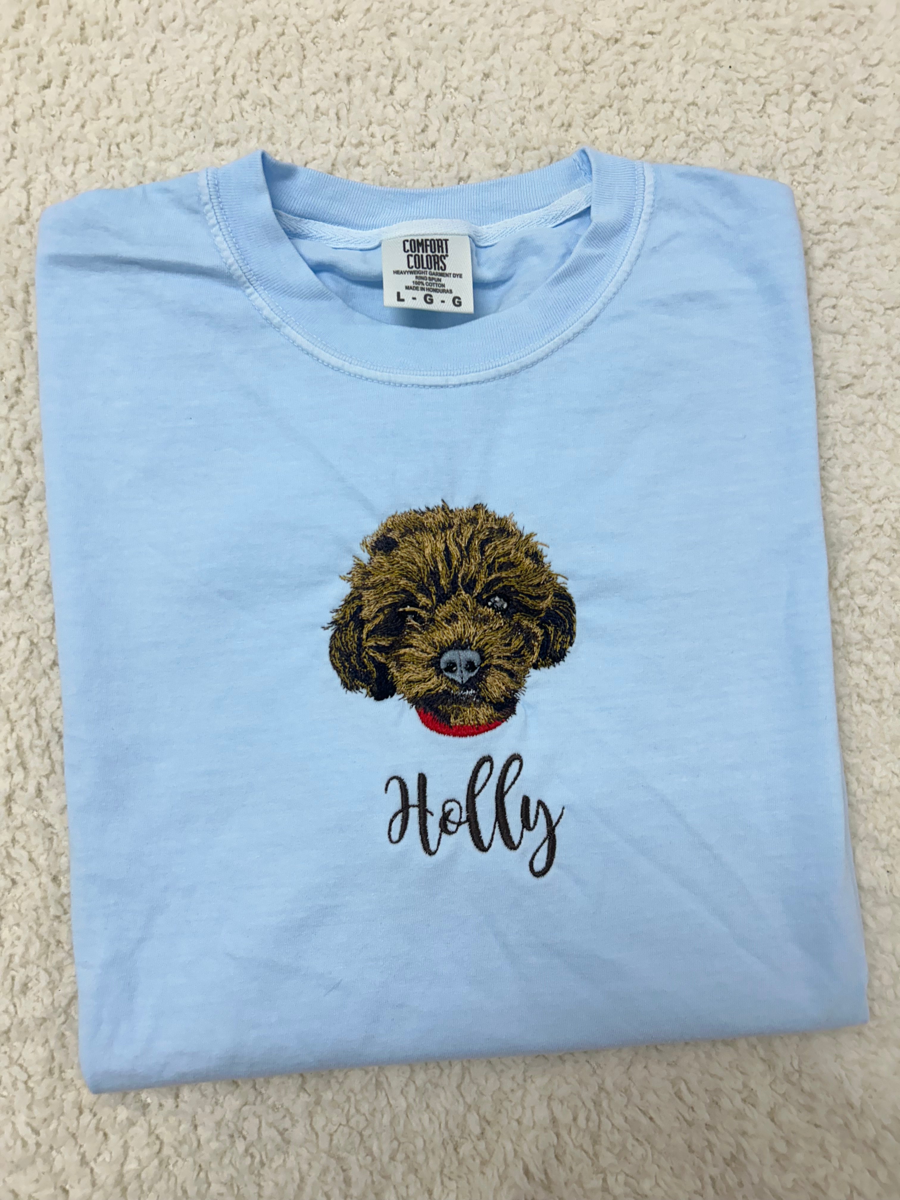 Fluffy Buddy custom embroidered pet portrait shirt with detailed stitching of a pet photo on a 100% cotton everyday tee