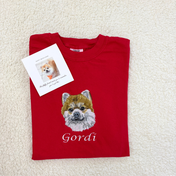 Fluffy Buddy custom embroidered pet portrait shirt with detailed stitching of a pet photo on a 100% cotton everyday tee