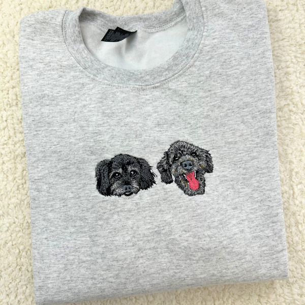 Fluffy Buddy custom embroidered pet portrait sweatshirt made from your photo, showing detailed stitching of a dog portrait on a cozy sweater