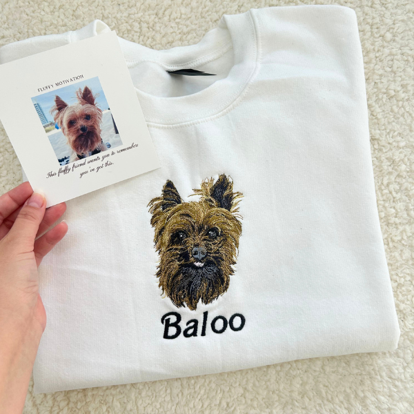 Fluffy Buddy custom embroidered pet portrait sweatshirt made from your photo, showing detailed stitching of a dog portrait on a cozy sweater